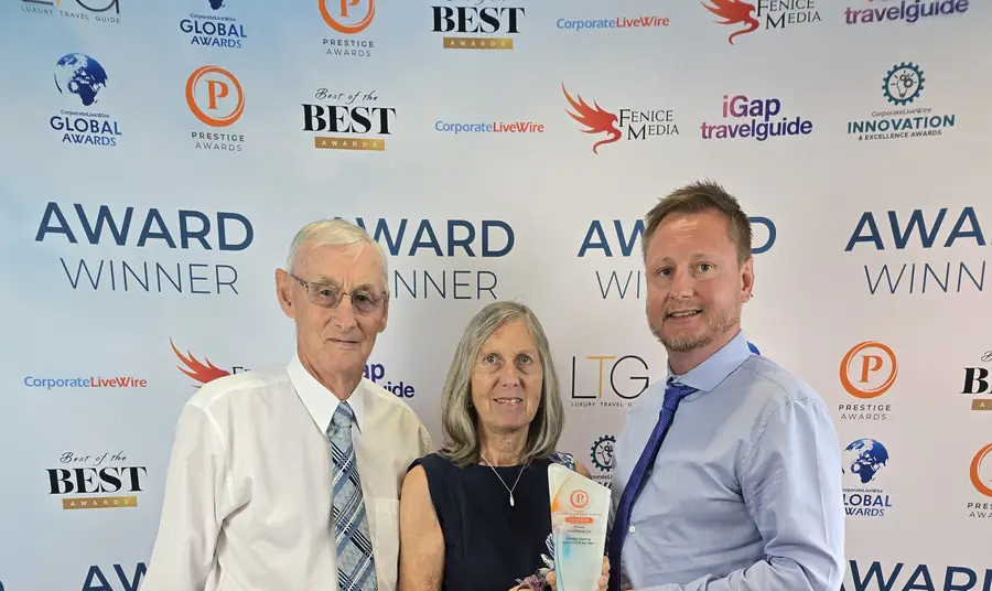 The Falcon Installations family collecting their award