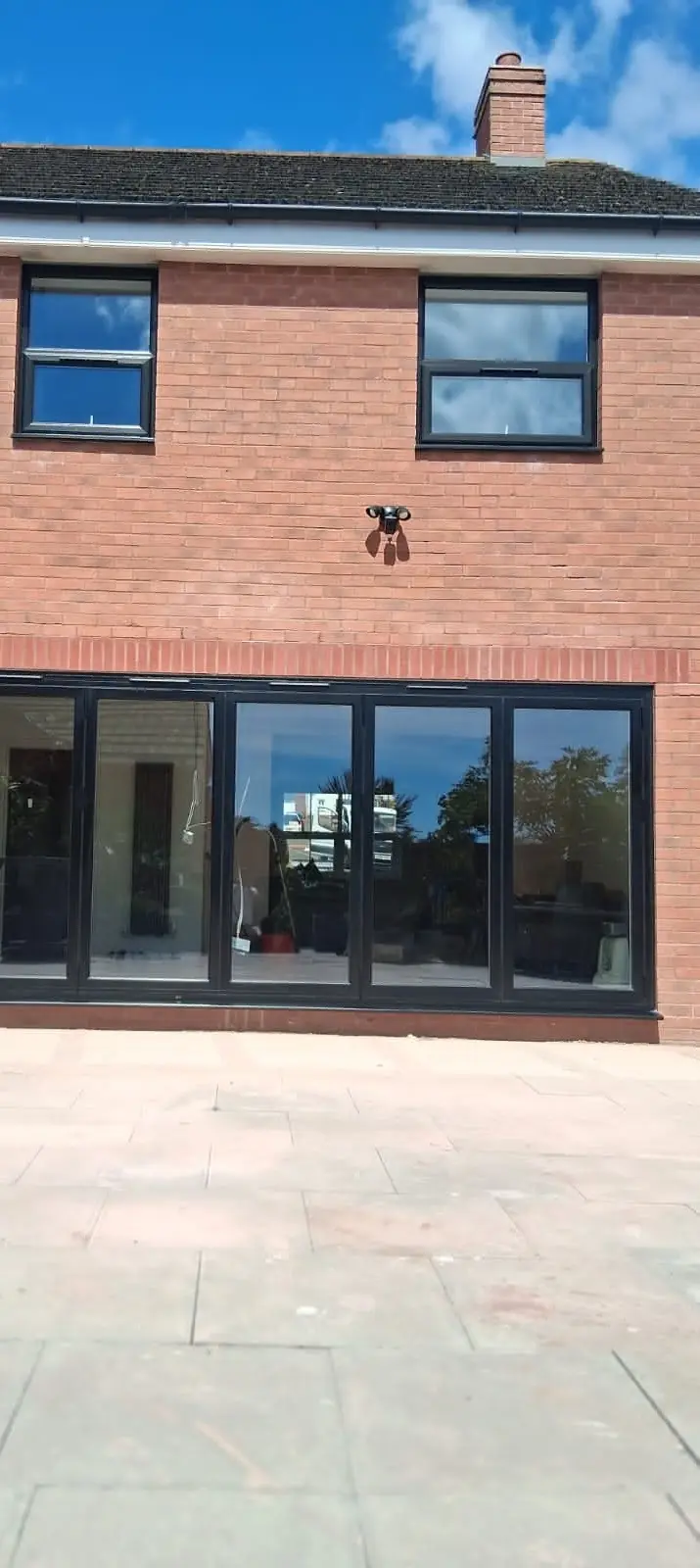Anthracite bifold doors on a Falcon installation