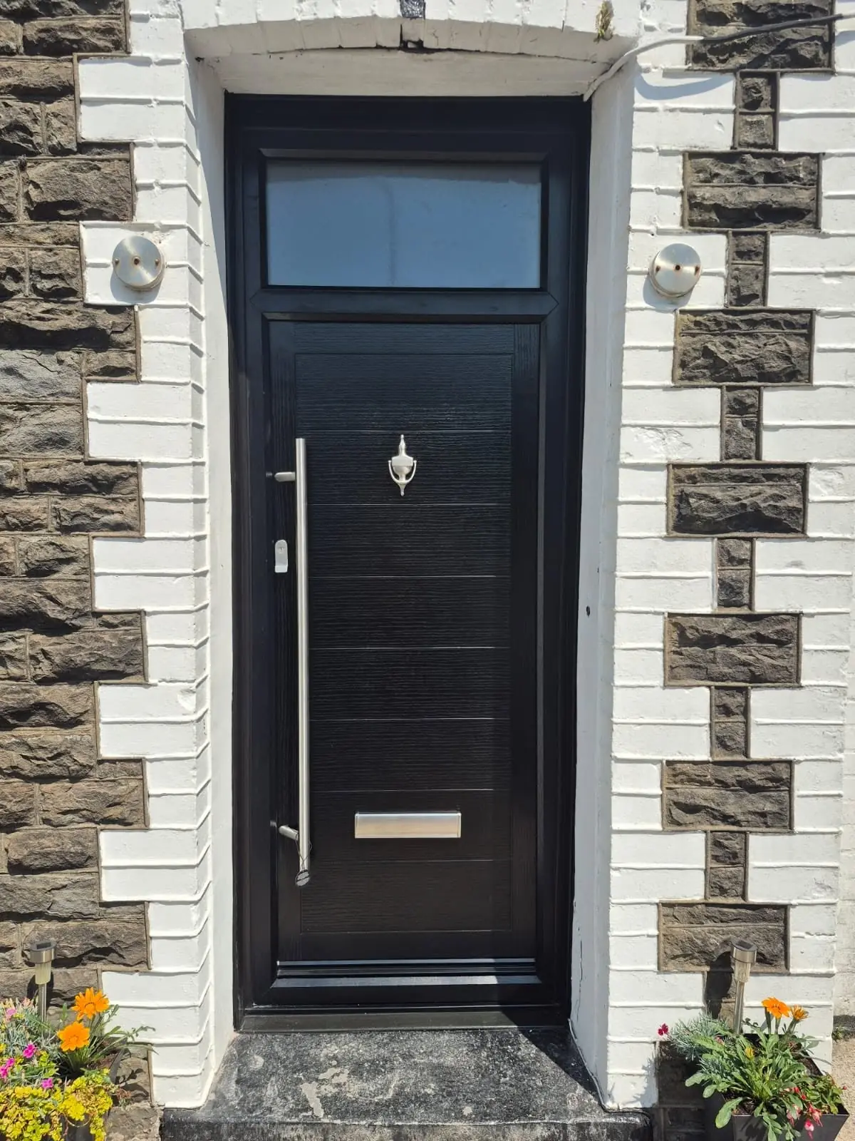 Black entrance door on a Falcon installation